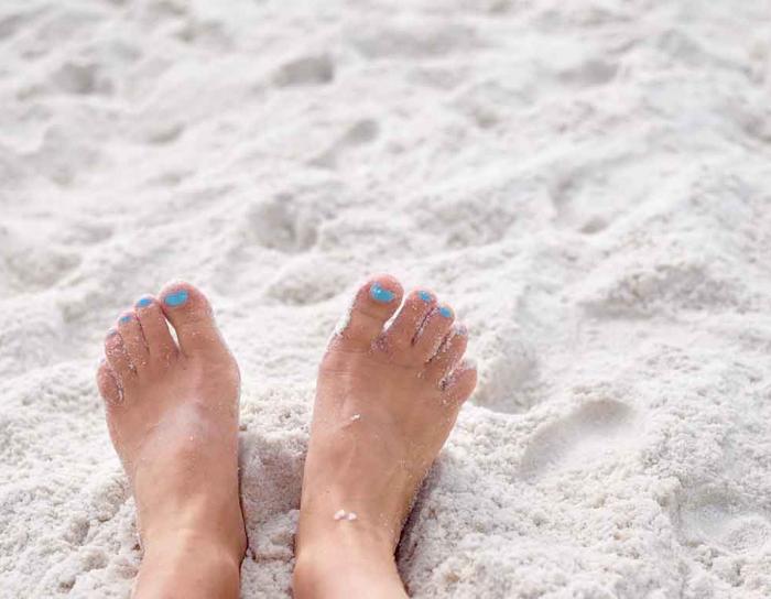 Feet in the sand