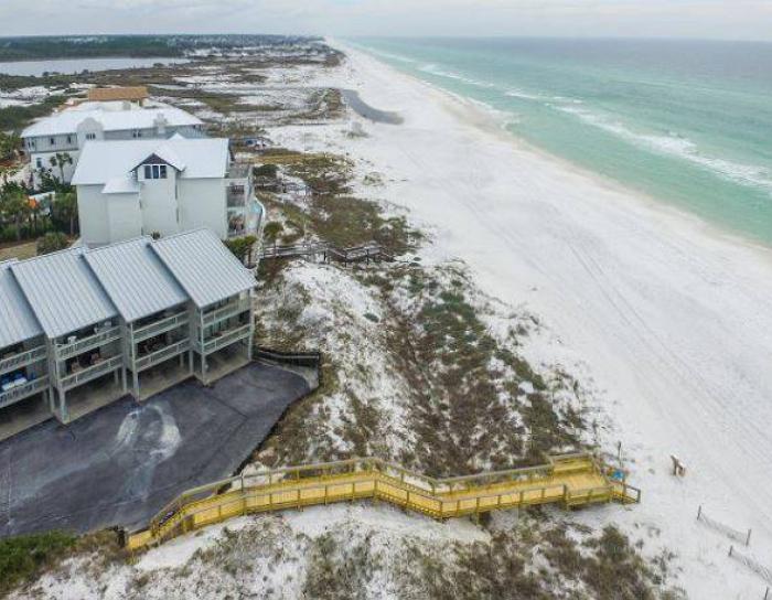 Ariel view of the beach and a home at Seagrove Beach