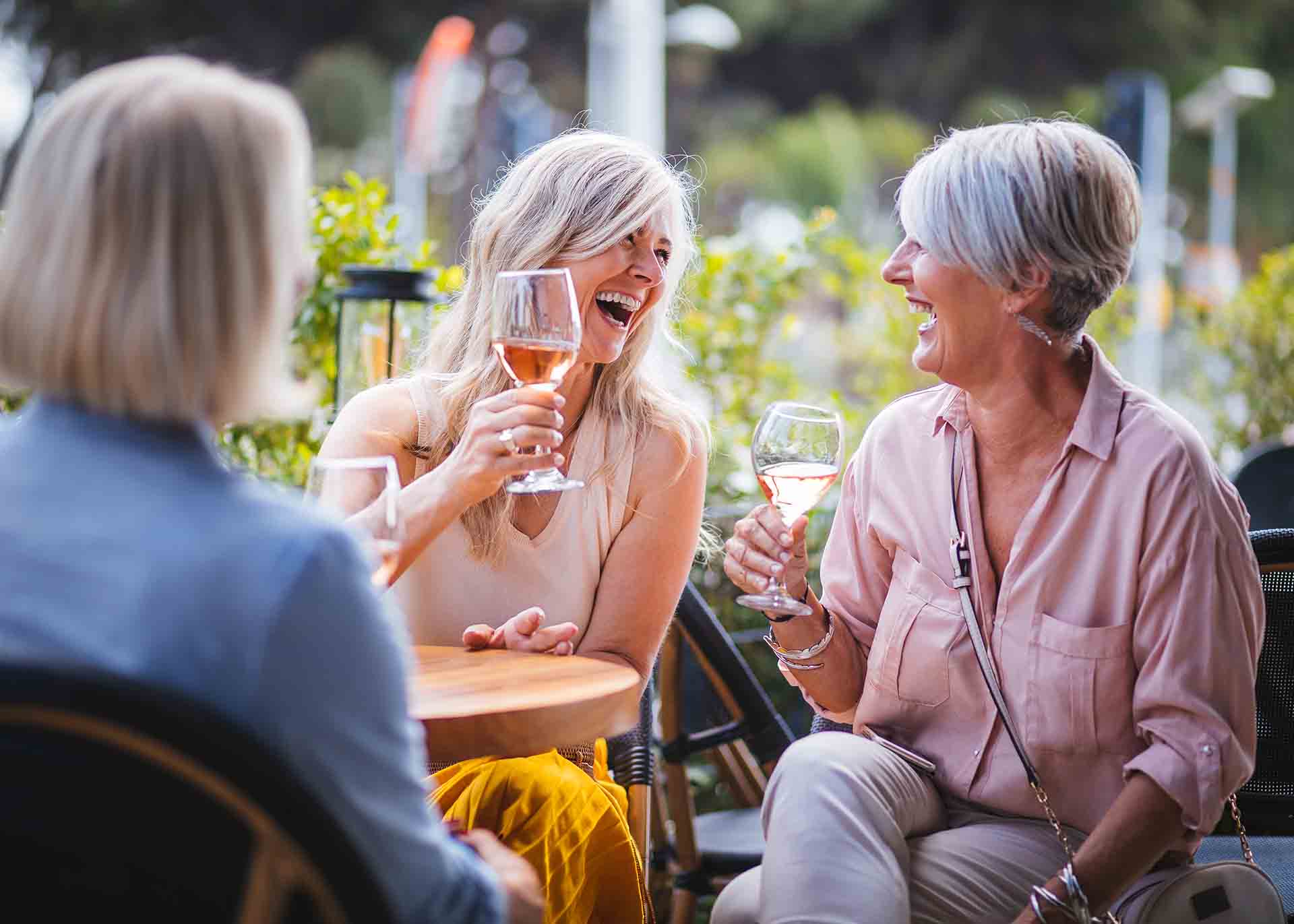 Friends enjoying wine together in Florida